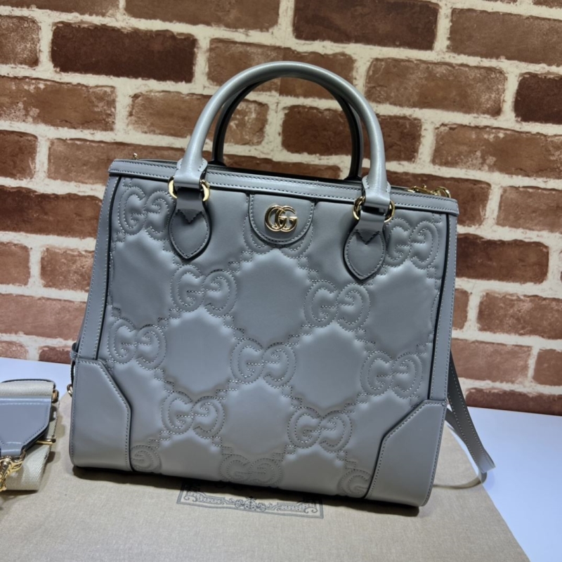 G*u*i top handle bags